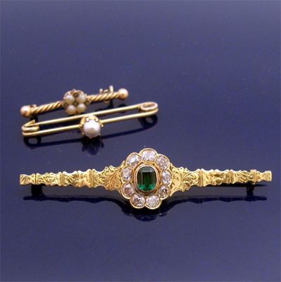 Appraisal: An Emerald and diamond cluster bar brooch seed pearl and