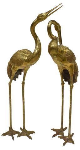 Appraisal: lot of Large brass standing cranes tallest approx h Provenance