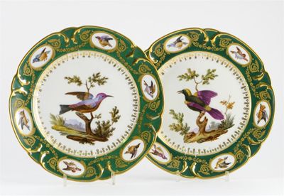 Appraisal: A pair of Paris porcelain plates the wells painted with