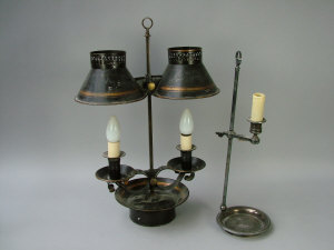 Appraisal: A tole ware bouillote black and gilt twin candle lamp