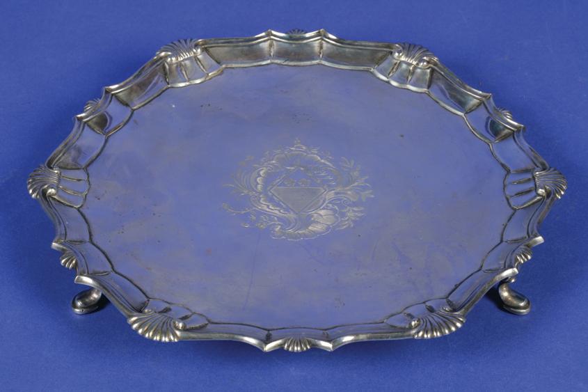 Appraisal: A GEORGE III SALVER of shaped circular form with a