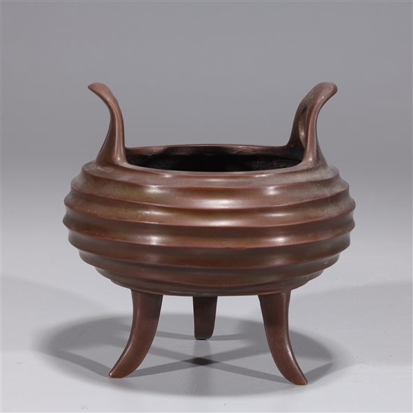 Appraisal: Chinese bronze tripod censer with six-character mark to base overall