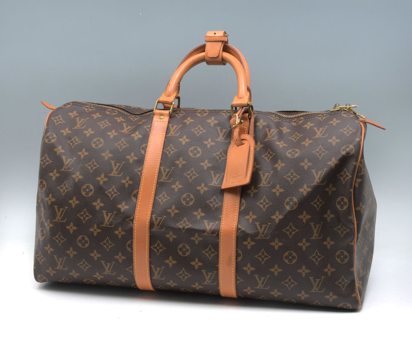 Appraisal: LOUIS VUITTON MONOGRAM KEEPALL BANDOULIERE This stylish bag is crafted