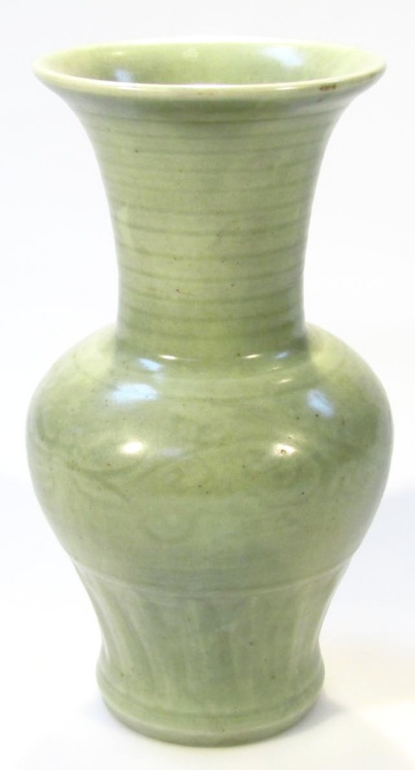 Appraisal: A Chinese celadon vase the circular shouldered body beneath a