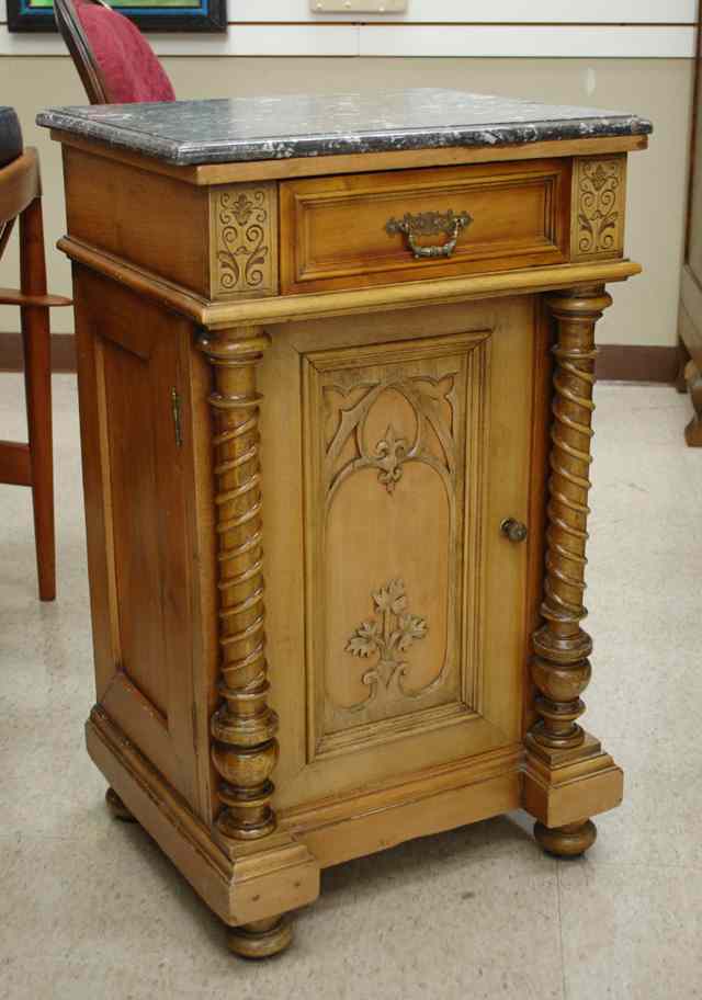 Appraisal: CARVED WALNUT CABINET NIGHTSTAND German c having a rectangular gray