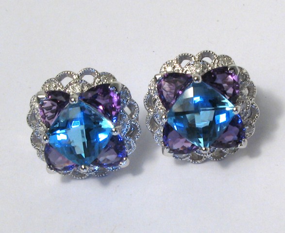 Appraisal: PAIR OF BLUE TOPAZ AND AMETHYST EARRINGS each centers a