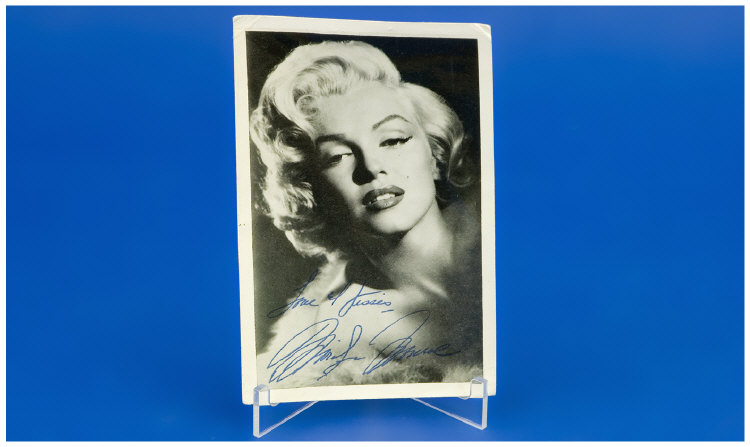 Appraisal: Marilyn Monroe Signed Photograph Signed love and kissed Marilyn Monroe