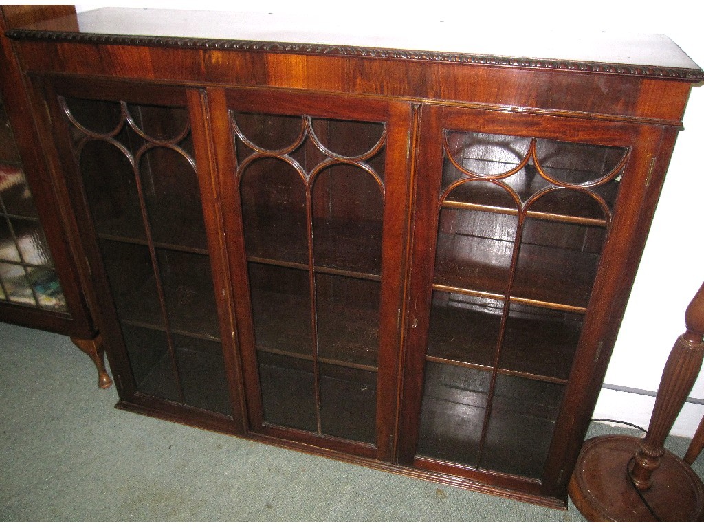 Appraisal: Mahogany three door bookcase top