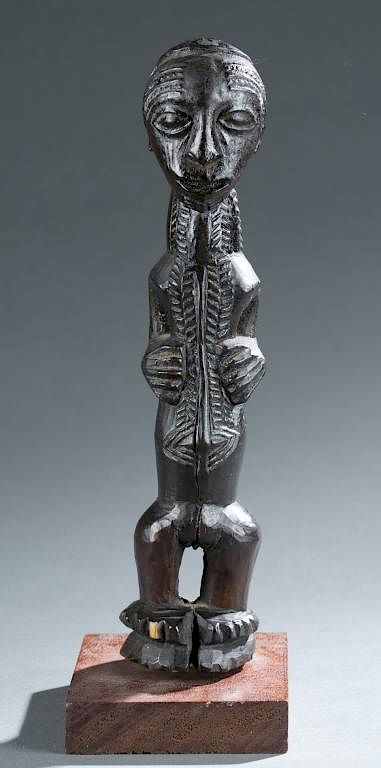 Appraisal: Standing figure A standing figure Bena Lulua Songe th century