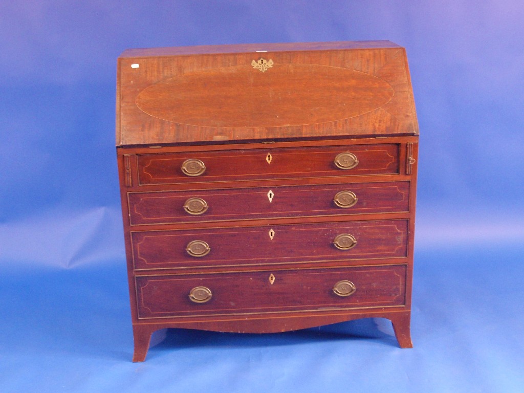 Appraisal: A George III mahogany bureau with fall flap revealing a