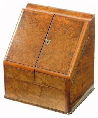 Appraisal: A Victorian burr walnut stationery cabinet having a pierced fret