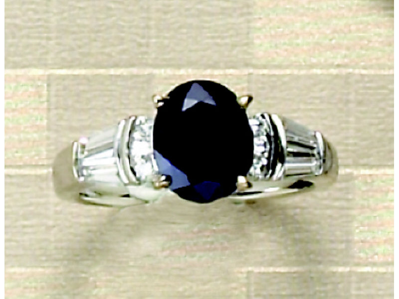 Appraisal: SAPPHIRE AND DIAMOND RING k white gold ring with one