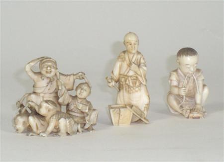 Appraisal: Three Japanese ivory okimono Meiji period comprising a figure group