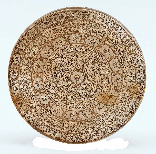 Appraisal: AN AGATE ROUNDEL with finely engraved decoration of rosettes and