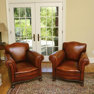 Appraisal: Very nice pair leather upholstered club chairs Very nice pair