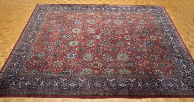 Appraisal: Floral Karastan Rug Red field with blue floral pattern and