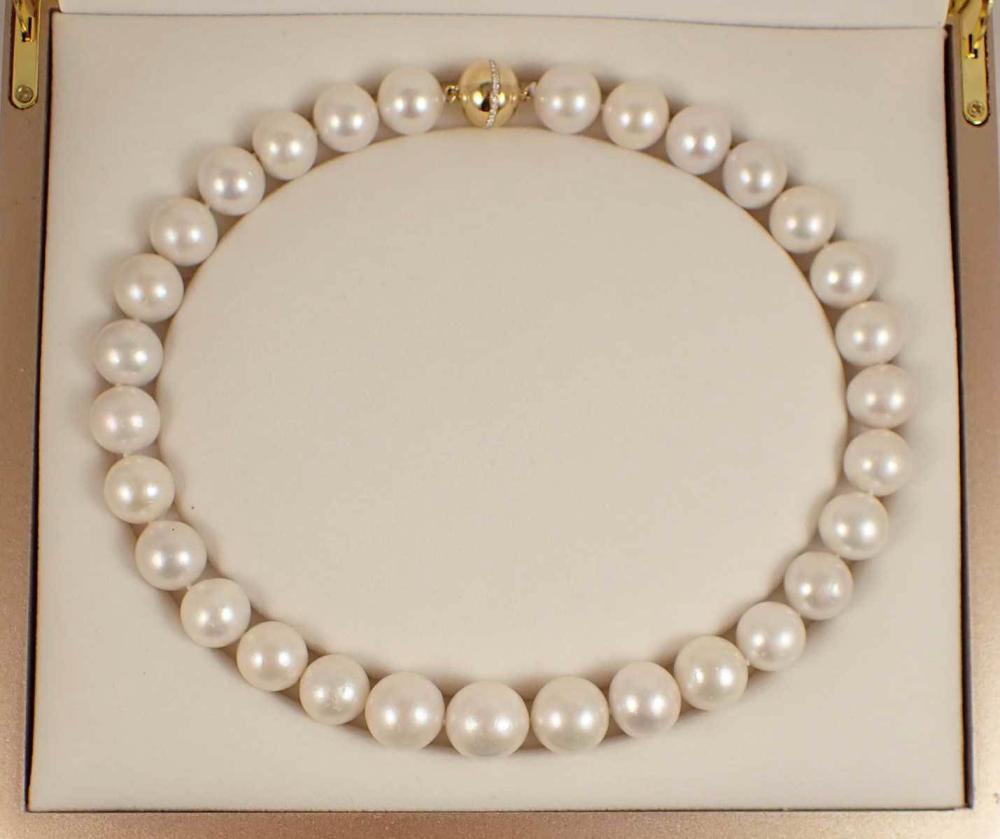 Appraisal: SOUTH SEA PEARL AND FOURTEEN KARAT GOLD NECKLACE hand-knotted strand