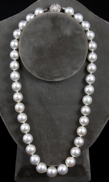 Appraisal: Natural South Sea Pearls - mm with kt clasp EST