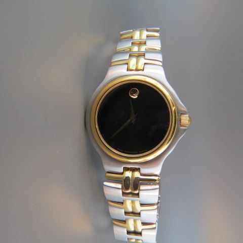 Appraisal: Movado Man's Wristwatch stainless with gold trim quartz unused