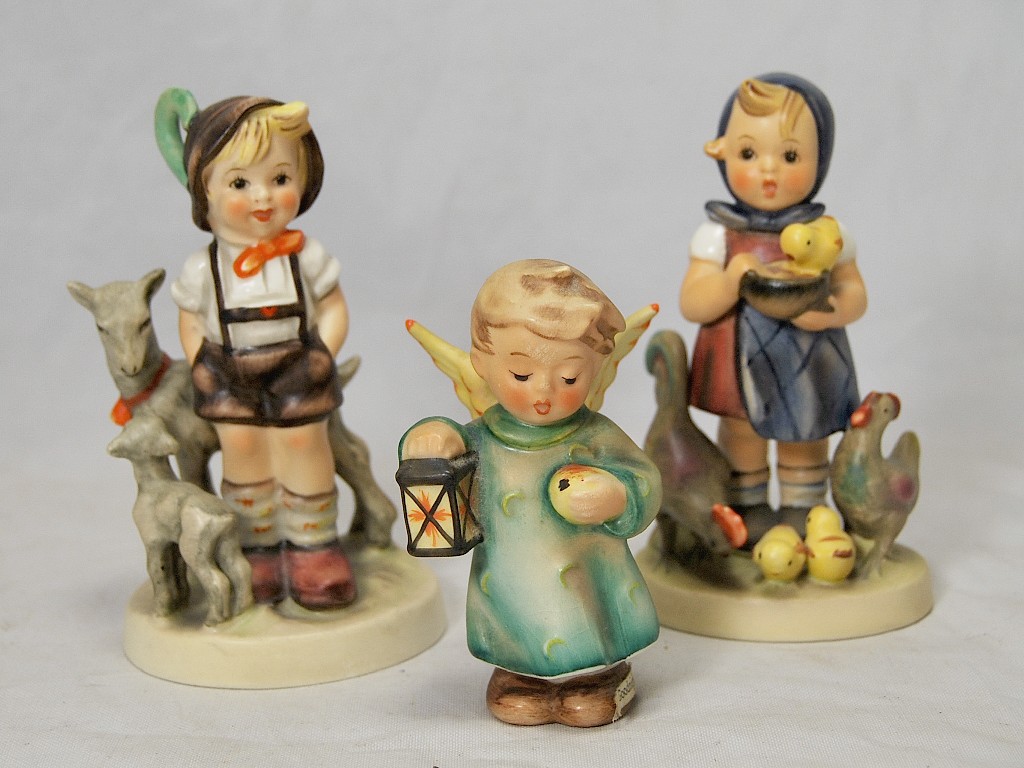 Appraisal: Three Hummell figure groups - 'Little Goatherder' 'Goodnight' and 'Feeding