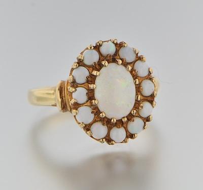 Appraisal: A Ladies' White Opal Cluster Ring k yellow gold ring