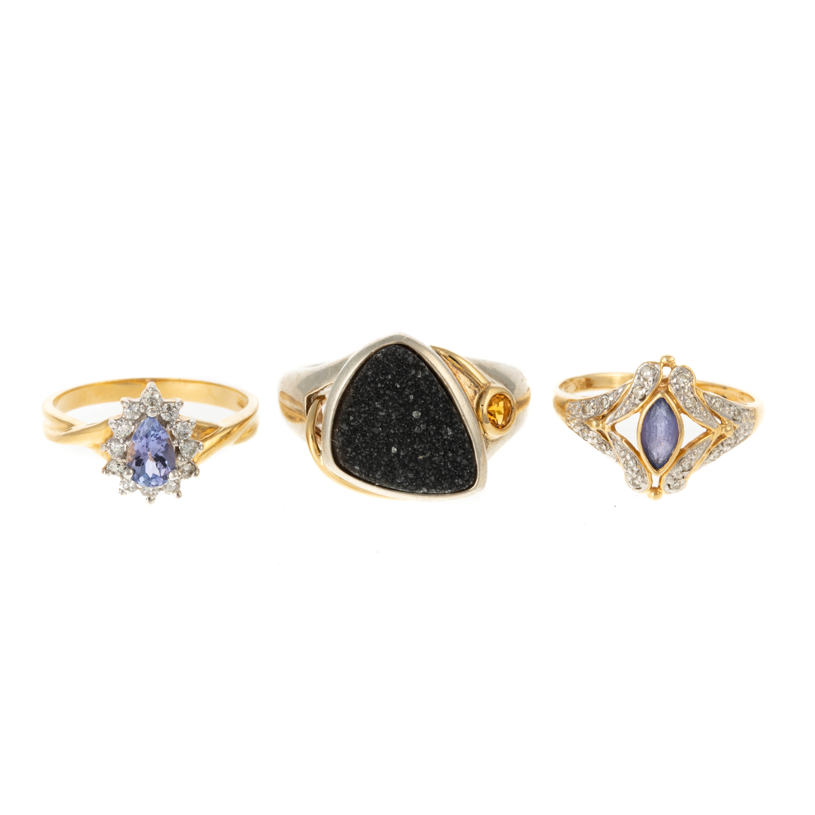 Appraisal: A TRIO OF GEMSTONE RINGS IN K STERLING K yellow