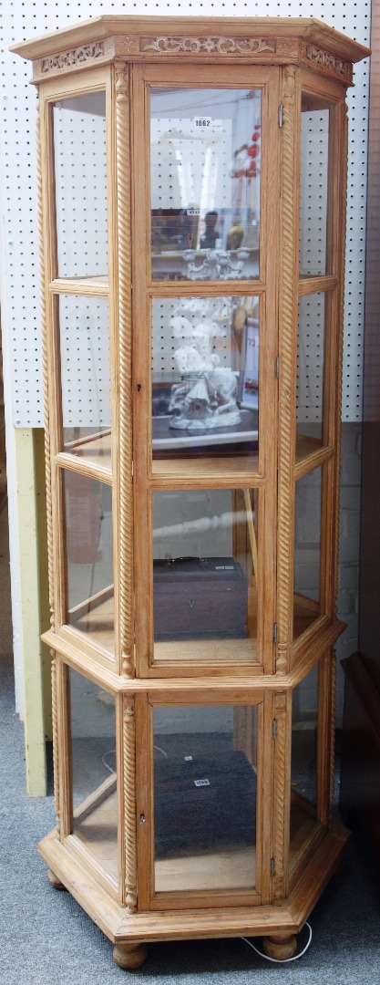 Appraisal: A th century limed oak floor standing octagonal four tier