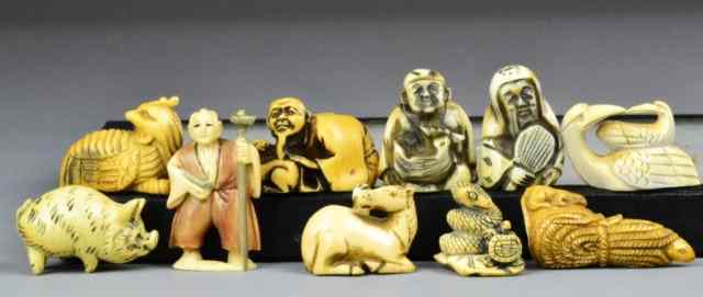 Appraisal: Japanese Carved Ivory NetsukesVariety of carved ivory netsukes crane snake