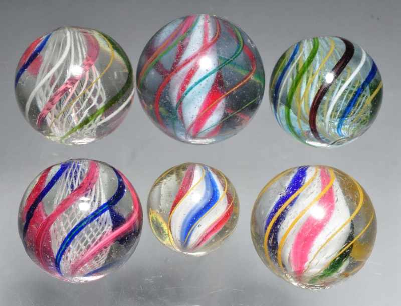 Appraisal: Lot of Swirl Marbles Description Various swirl marbles include three