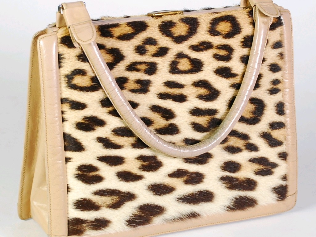 Appraisal: CIRCA 's LEOPARD SKIN AND LEATHER HANDBAG