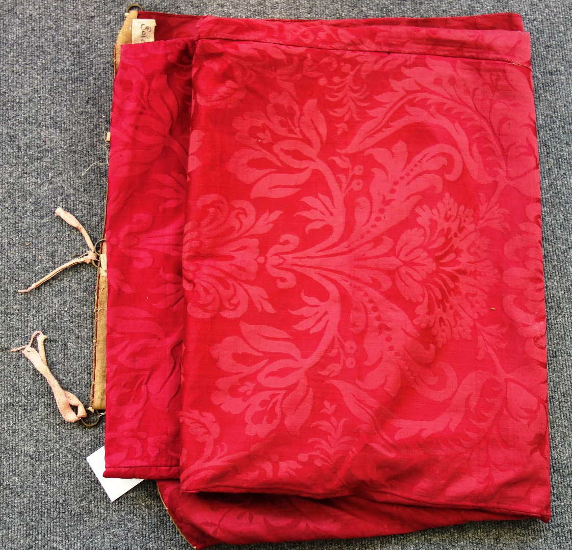 Appraisal: A red silk damask hanging late th early th century