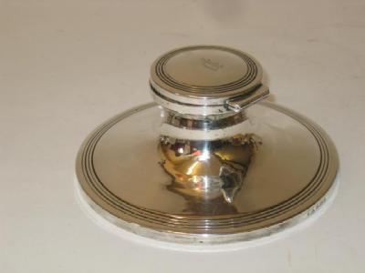 Appraisal: A CAPSTAN INKWELL maker Adie Brothers Birmingham the hinged lid