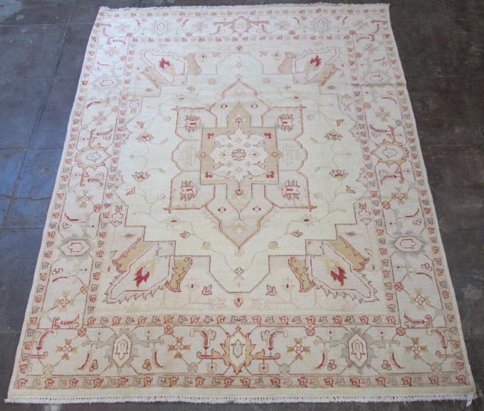 Appraisal: HAND KNOTTED ORIENTAL CARPET Oushak design of West Anatolia red