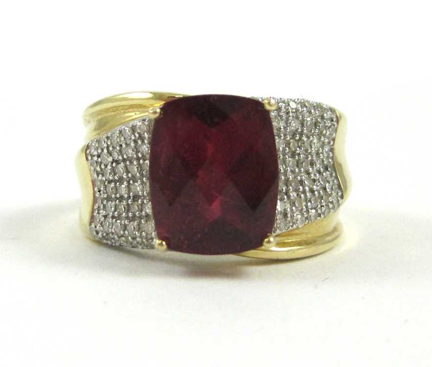 Appraisal: LAURA RAMSEY RUBELLITE AND DIAMOND RING k yellow and white