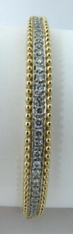 Appraisal: K Yellow Gold Diamond Bangle Bracelet containing approximately ctw of