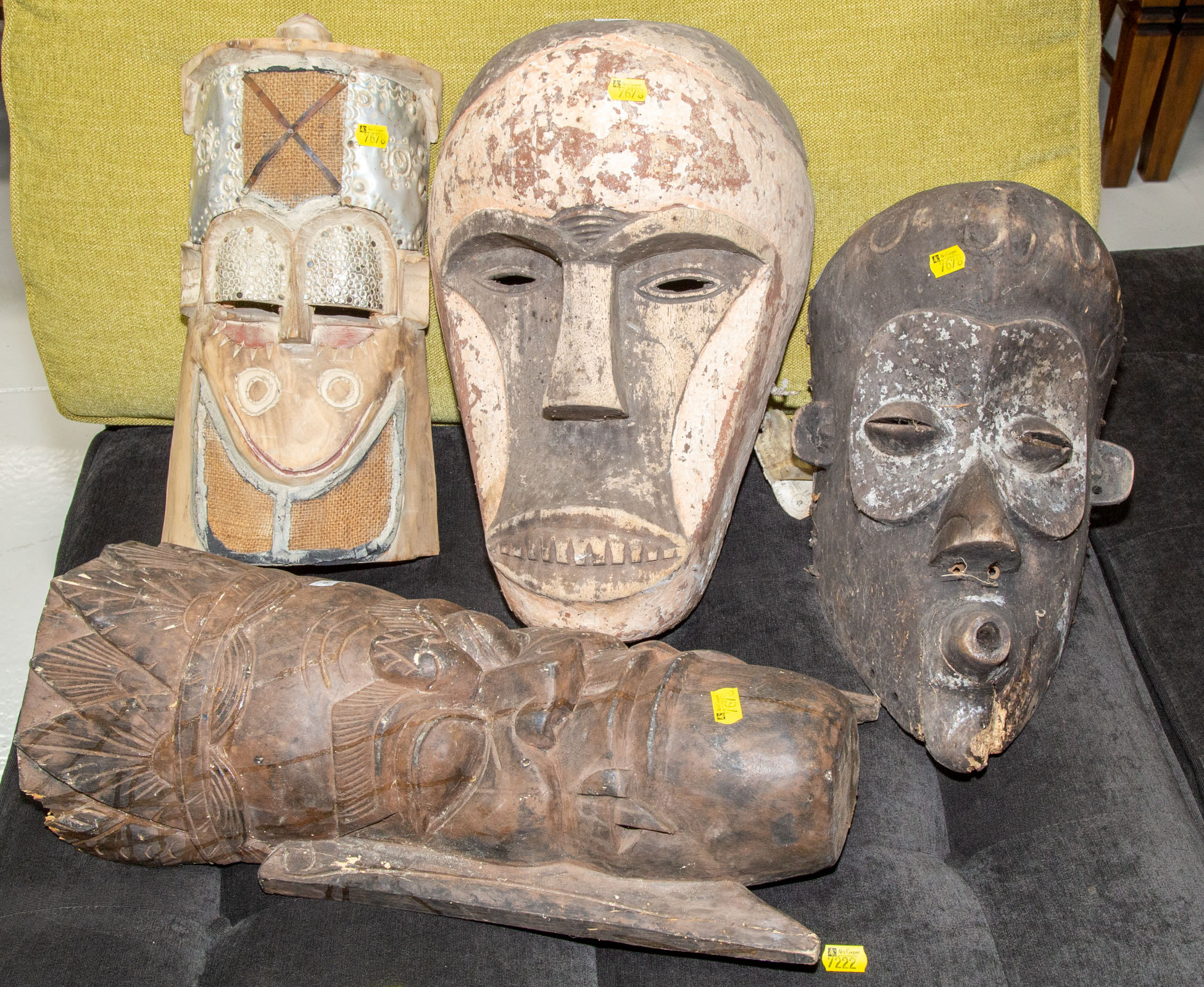 Appraisal: FOUR DECORATIVE MASKS Including African and Indonesian items