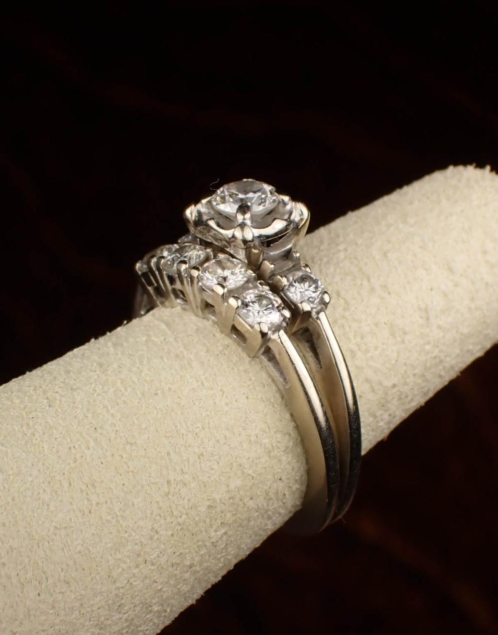 Appraisal: DIAMOND AND FOURTEEN KARAT GOLD WEDDING SET including a k