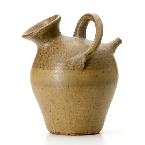 Appraisal: KAREN KARNES Ceramic water jug covered in brown and olive