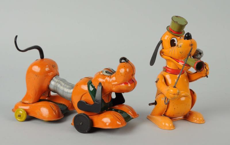 Appraisal: Lot Of Wind-Up Pluto Toys One is by Linemar and