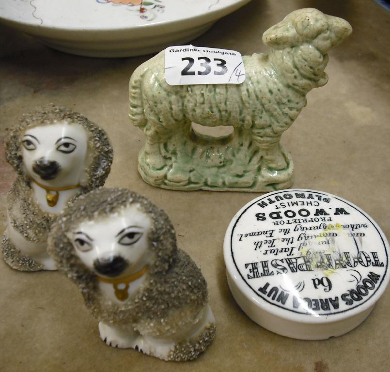 Appraisal: Pair of Staffordshire style miniature porcelain dogs with encrusted coats