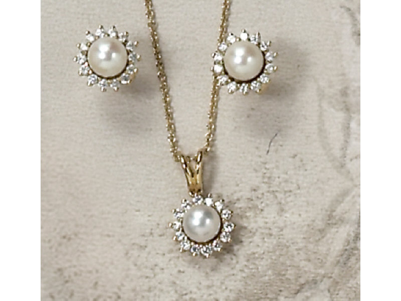 Appraisal: TIFFANY CO PEARL AND DIAMOND SET k yellow gold pendant