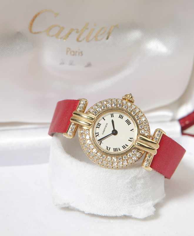 Appraisal: A lady's K gold wristwatch Cartier 'Vendome' The round dial