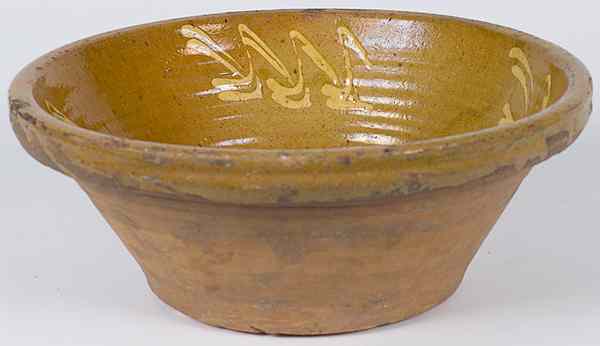 Appraisal: Slipware Bowl probably German a slipware bowl with yellow decoration