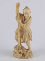 Appraisal: An ivory figure circa 's of a fisherman spearing a