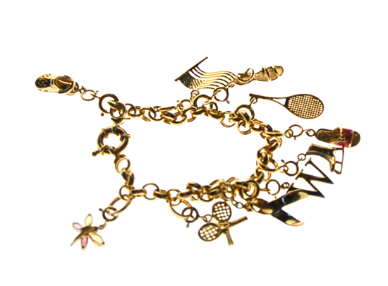 Appraisal: A Gold Charm Bracelet K marked yellow gold with ten