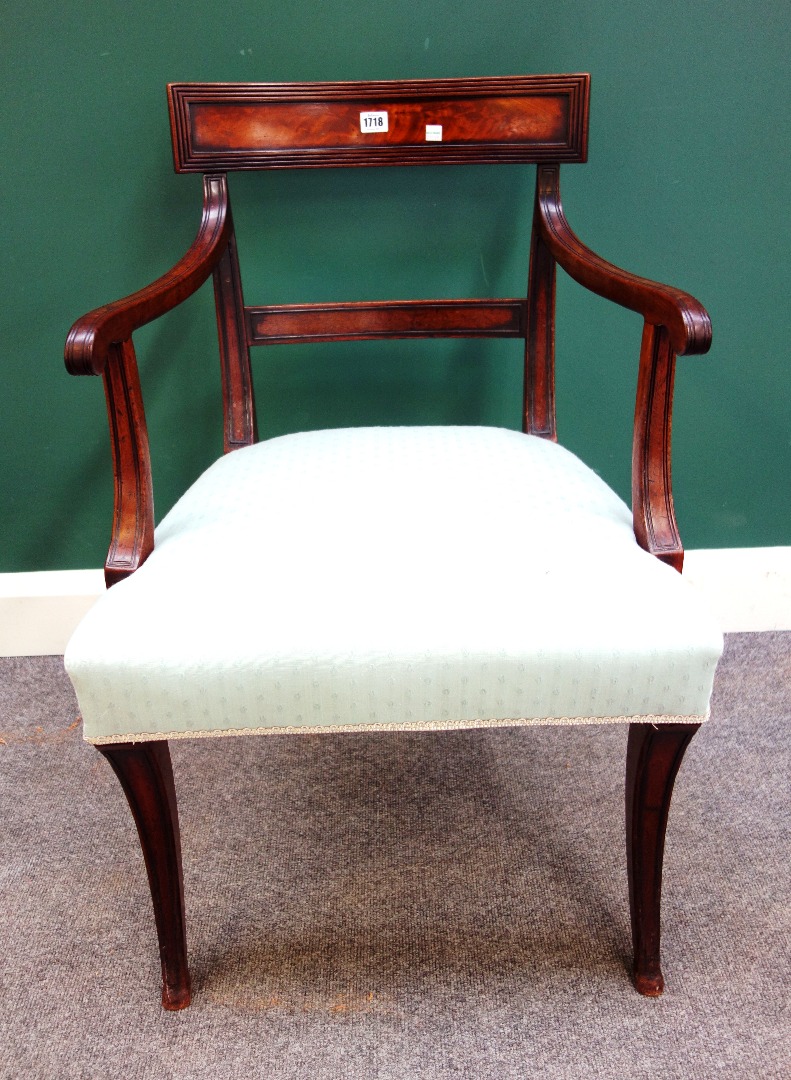 Appraisal: A Regency mahogany bar back carver chair on sabre supports