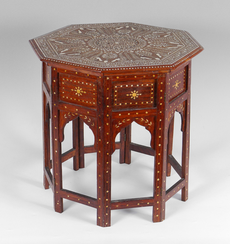 Appraisal: INDIAN BONE INLAY OCTAGONAL TABLE Profusely inlaid top with birds