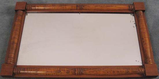 Appraisal: A Federal Empire Wall Mirror grain painted with turned a