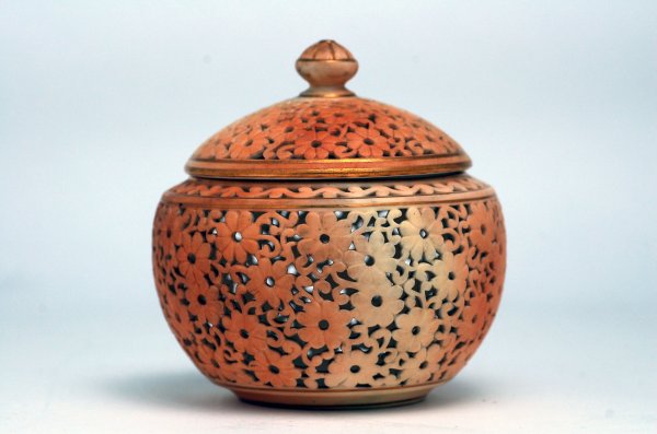 Appraisal: Circa Royal Worcester reticulated covered jar having floral pattern in