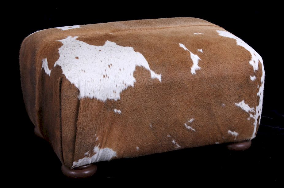 Appraisal: Holstein Cow Hide Ottoman with Pillows Offered in this lot